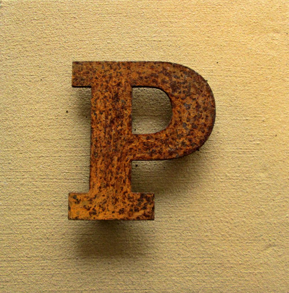weathered-steel-letter