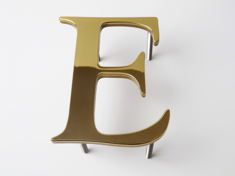 Polished brass letters