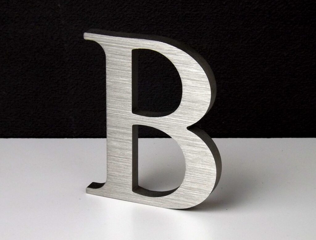 letter B in brushed stainless steel